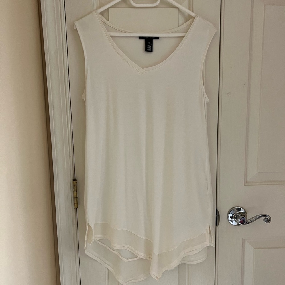 White House Black Market beige sleeves blouse with ruffle details.